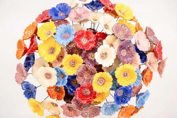 Handmade ceramic poppy flower with refined details
