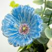 Kleine Tischdekoration mit Gartenmohnblume
