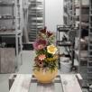 Kleine Tischdekoration mit Gartenmohnblume