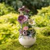 Kleine Tischdekoration mit Gartenmohnblume