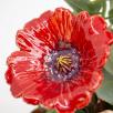 Kleine Tischdekoration mit Gartenmohnblume