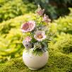 Kleine Tischdekoration mit Gartenmohnblume