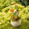 Kleine Tischdekoration mit Gartenmohnblume