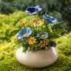 Große Tischdekoration mit Gartenmohnblumen
