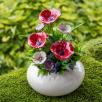 Große Tischdekoration mit Mohnblumen