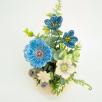 Kleine Tischdekoration mit Gartenmohnblume