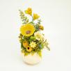 Kleine Tischdekoration mit Gartenmohnblume