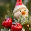 Kleine Weihnachts-Tischdekoration mit Schneekopf 