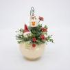 Weihnachts-Tischdekoration mit Schneekopf