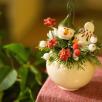 Weihnachts-Tischdekoration mit Schneekopf