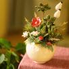 Weihnachts-Tischdekoration mit Hagebutte